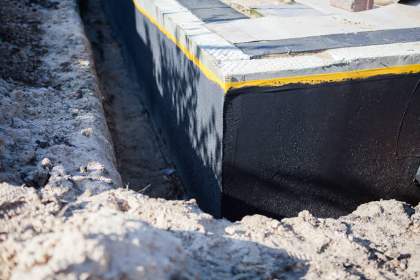 Professional Interior Drainage System technician working in Westport, IN
